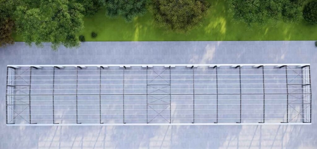 Espacio interior de gran luz libre resultante de nuestra eficiente construccion de galpones industriales.