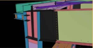 Close-up of a high-strength bolted moment connection in a structural steel workshop rigid frame.