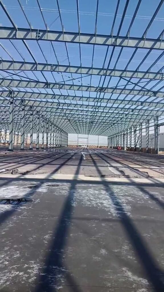 Symmetrical column spacing inside an economical steel warehouse designed for maximum floor space and lower foundation costs.