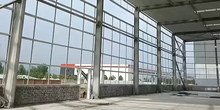 Structural wall framing and secondary purlin systems fabricated precisely by a large volume steel structure supplier for maximum structural stability in logistics parks.