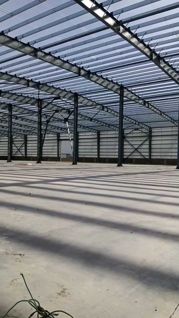 Heavy-duty wall cross-bracing and column connections fabricated by an established warehouse building supplier China facility.