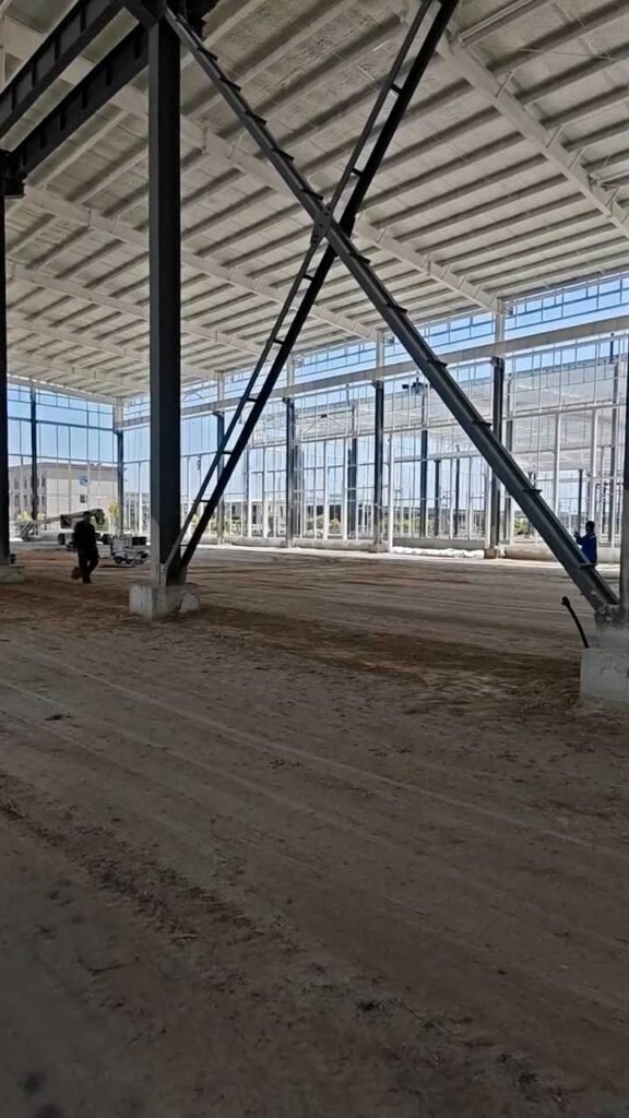 Steel columns and X-bracing installation for industrial warehouse structural design Melbourne.